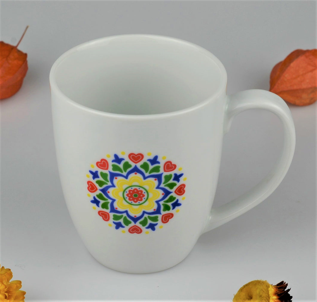 Porcelain cup with moravian ornaments - right handed