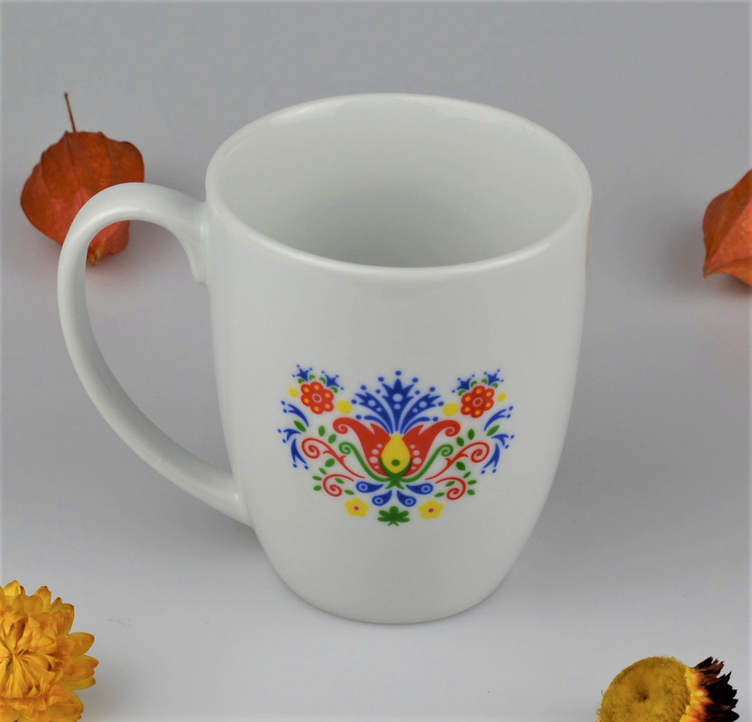Porcelain cup with moravian ornaments - left handed