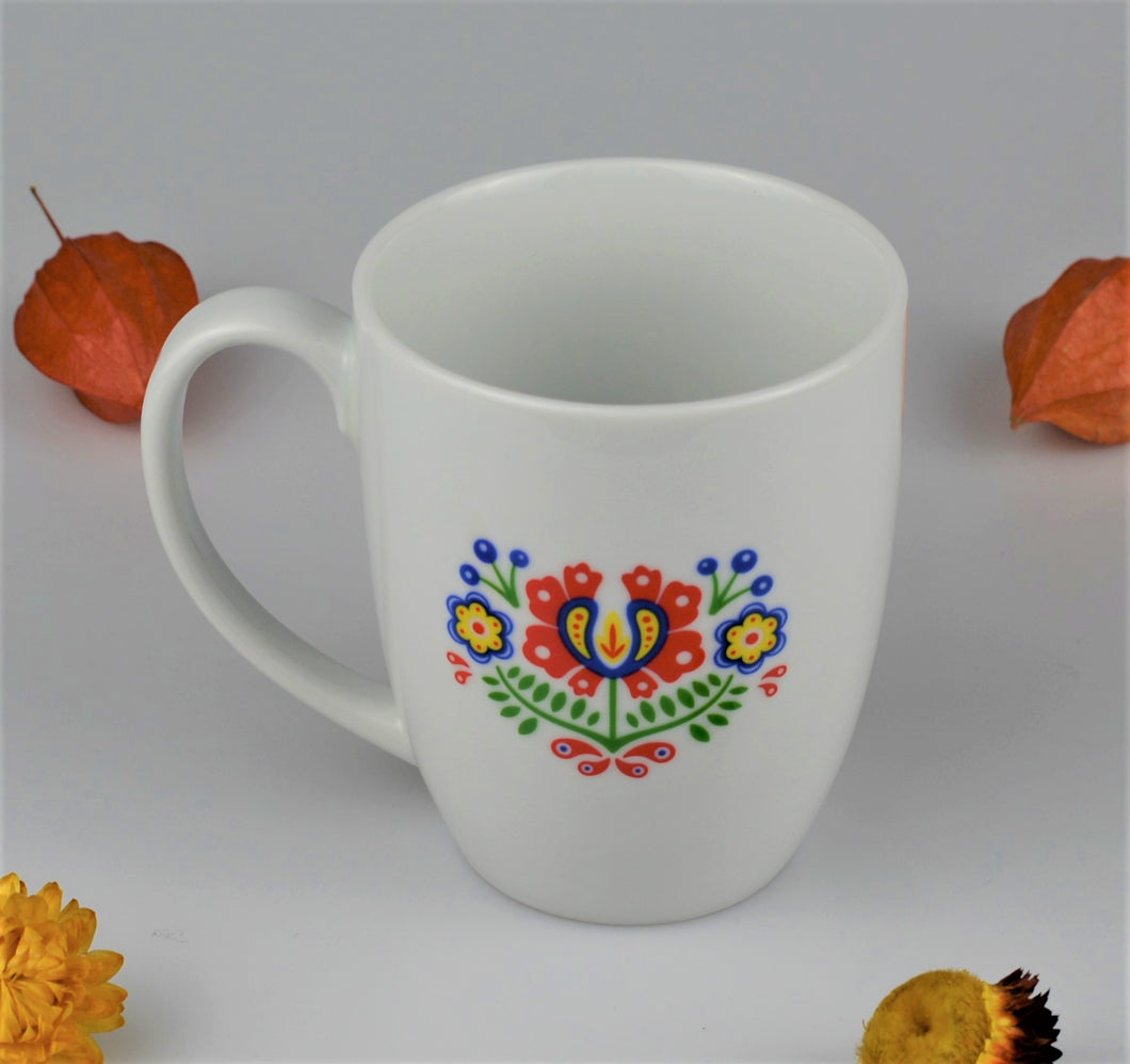 Porcelain cup with moravian ornaments - left handed